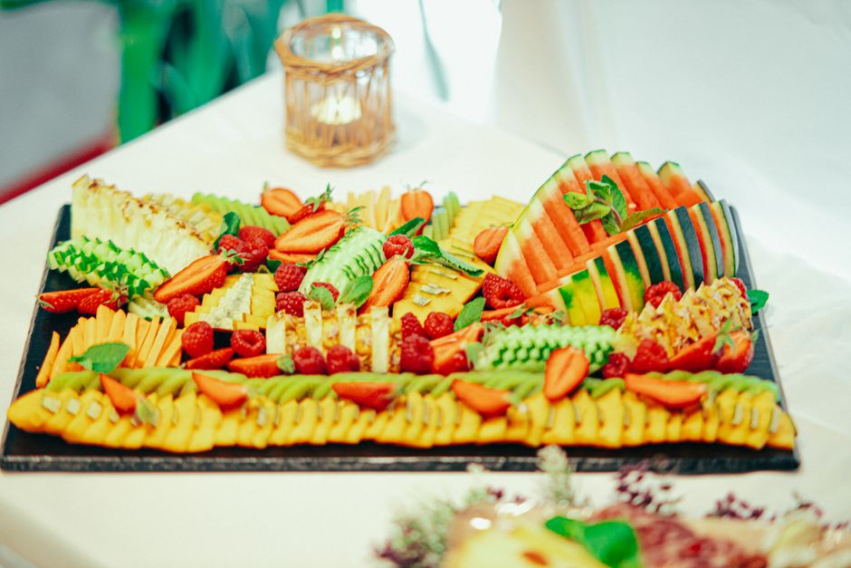 A vibrant fruit platter featuring watermelon, pineapple, berries, and more for a refreshing treat.